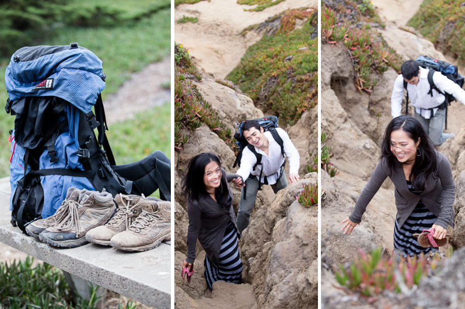 The engaged couple climbing up the trail from the beach with hiking boots and bag