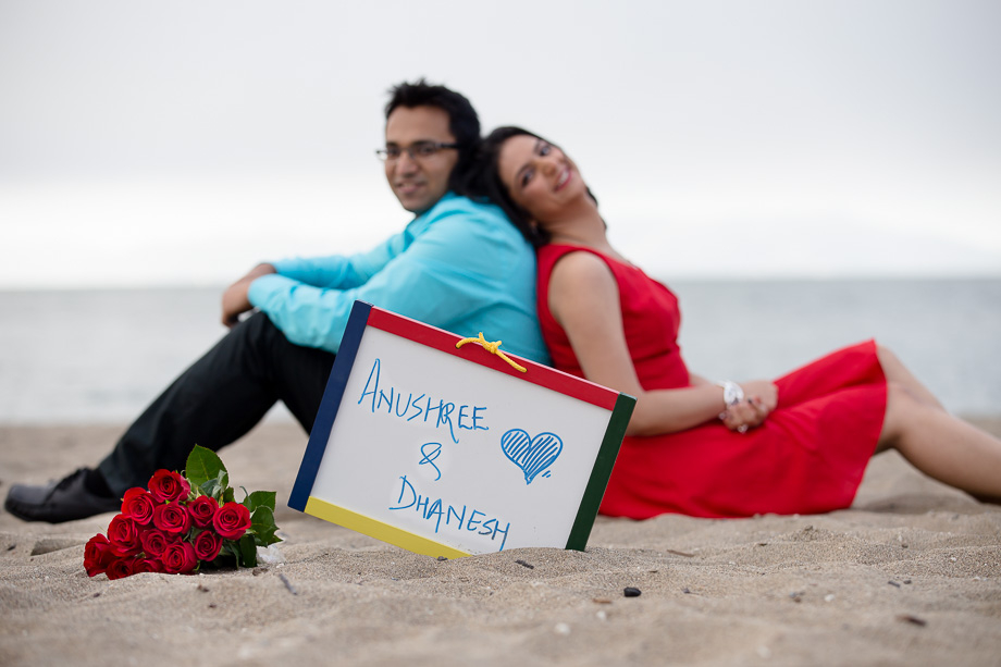 Anu and Dhanesh on the beach in San Francisco
