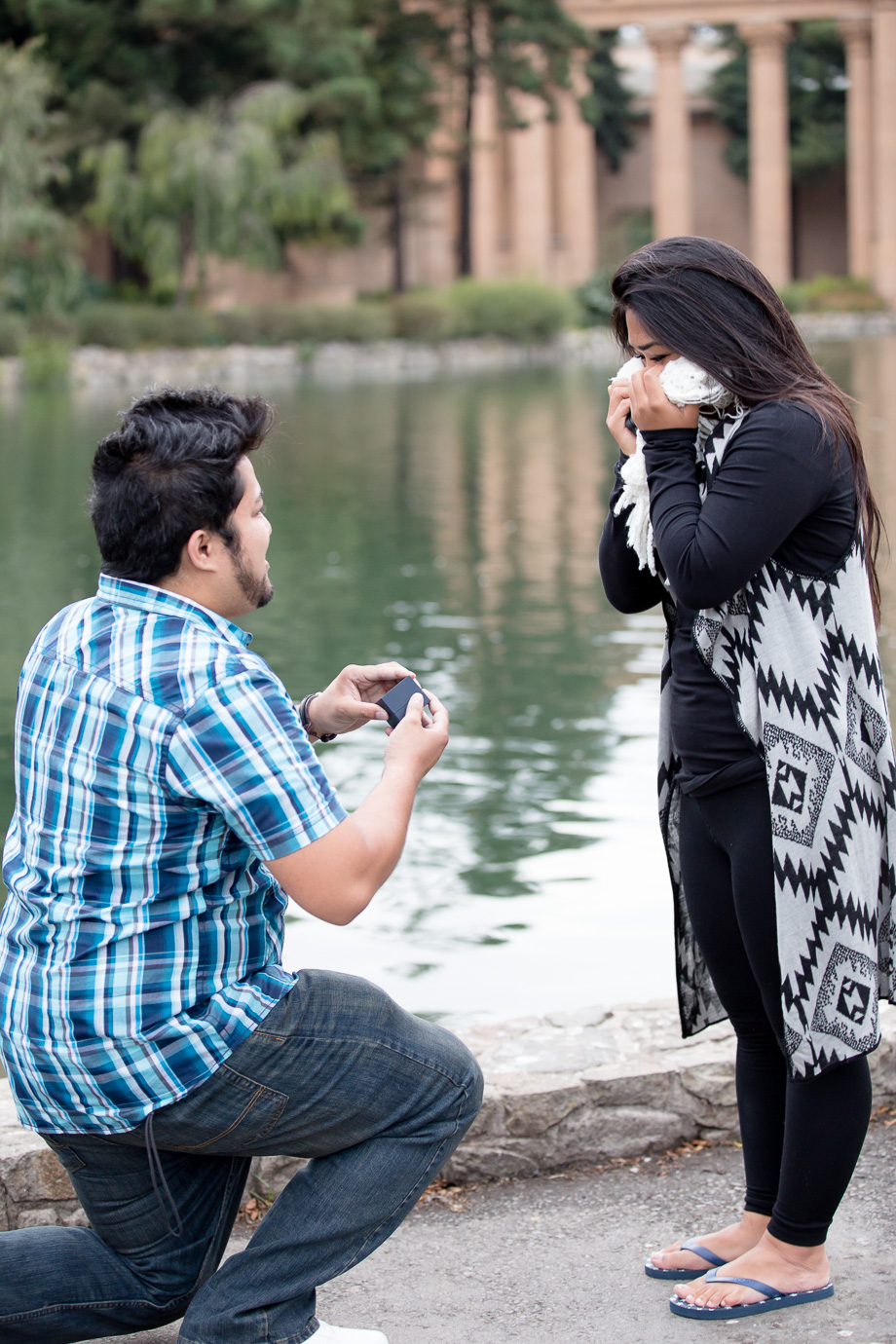 Shock and joy from future bride when seeing the ring for the first time - proposal at Palace of Fine Arts