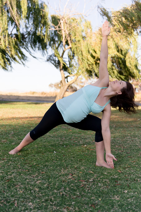 Yoga exercises at the park - maternity photo shoot