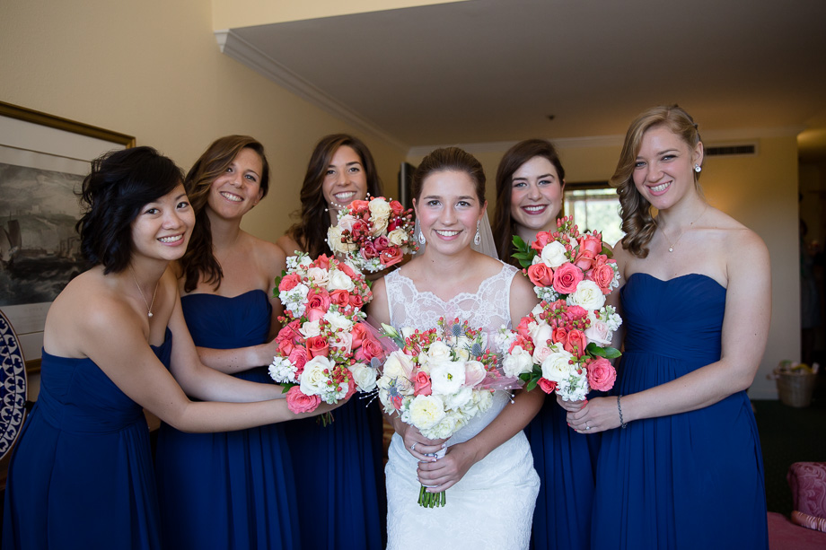 The bridesmaids and bride with their bouquets at the Stanford Park Hotel getting ready room