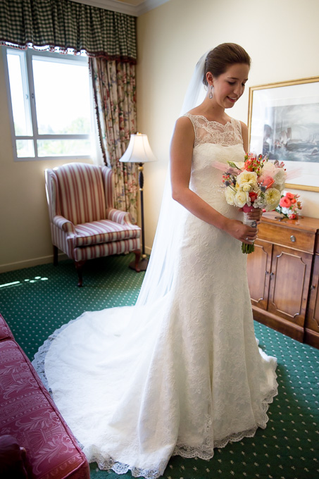 Bride all dressed and ready to go with her bouquet