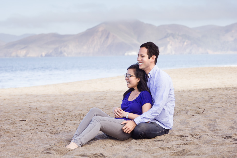 Happily ever after at Baker Beach with mountains and sea in the background