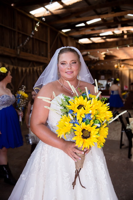 Bride with her beautiful sunflower bouquet