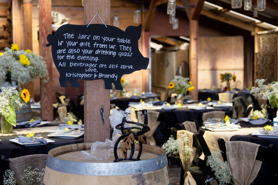 Cute pig sign for party favors at wedding reception