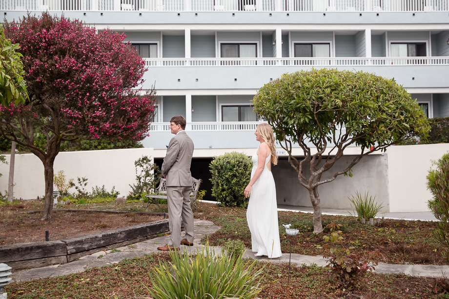 A romantic first look outside Oceano Hotel in Half Moon Bay