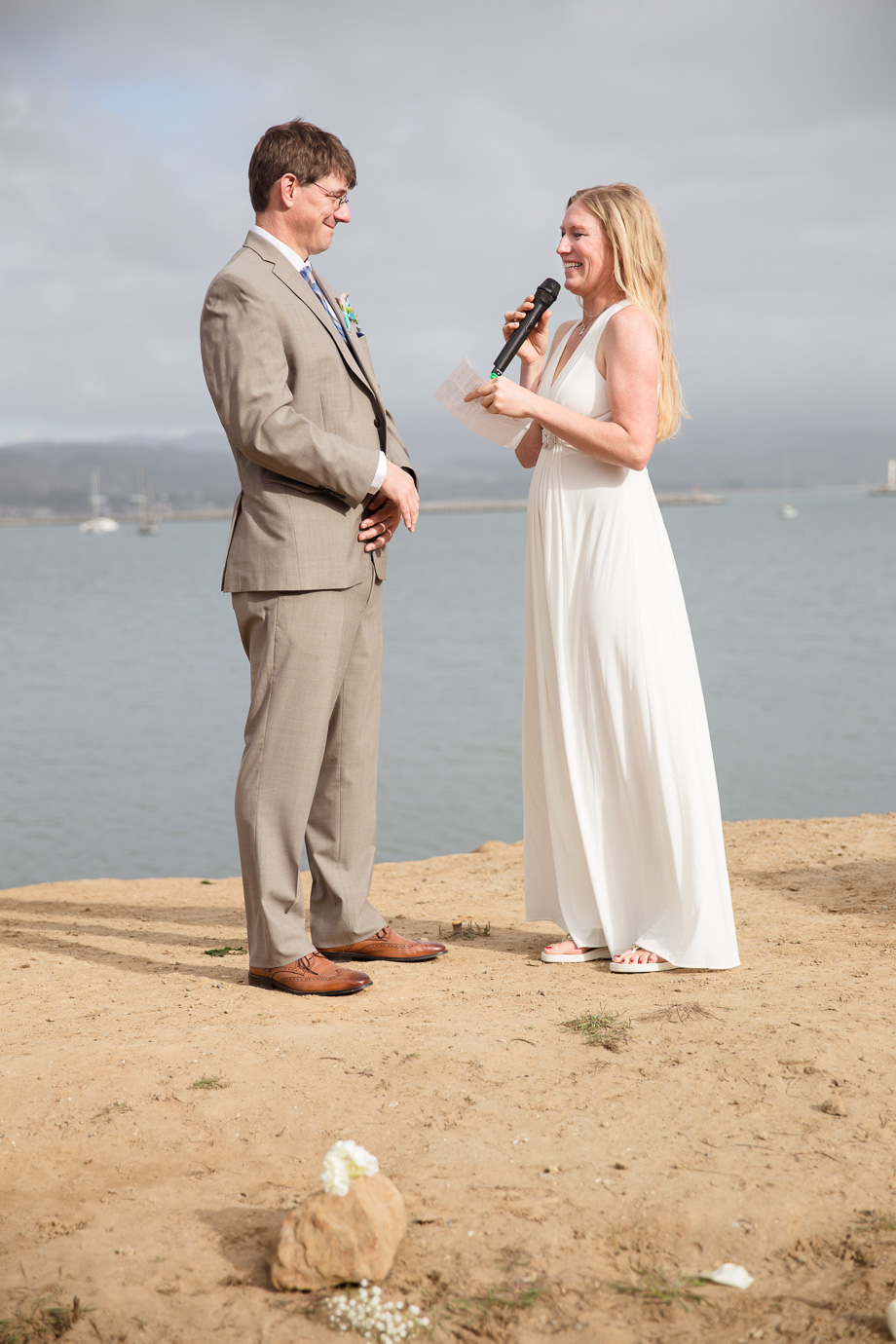 Beide and groom exchanging vows on this quiet Half Moon Bay beach at Princeton-by-the-Sea