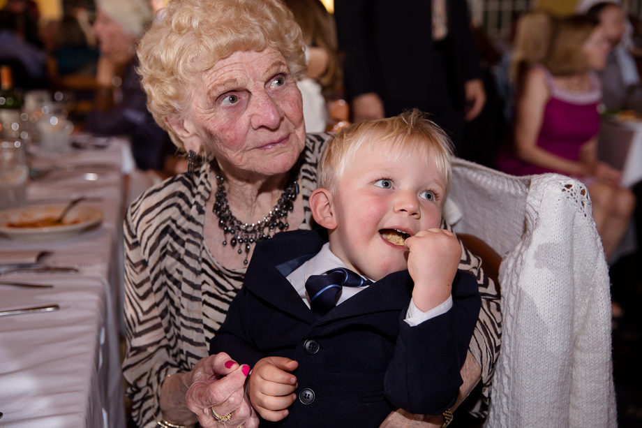 Little ring bearer with great grandma at the reception held at the Mezzaluna restaurant