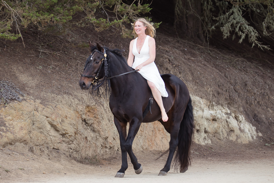 The cool bride made her grand entrance by riding a horse in Half Moon Bay