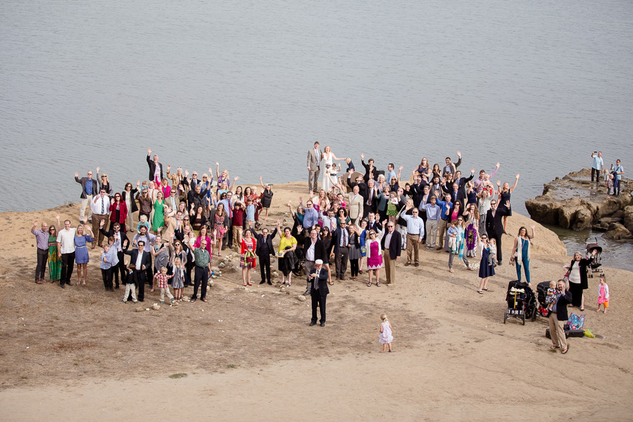 a group shot of all the guests at the ceremony site at Mavericks Surf Break in Half Moon Bay