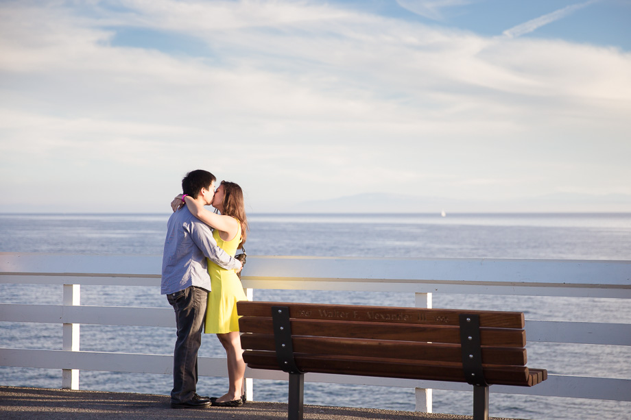 couple kissing at the end of the Santa Cruz pier
