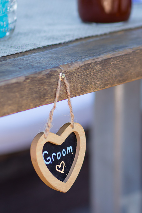 The wooden groom sign