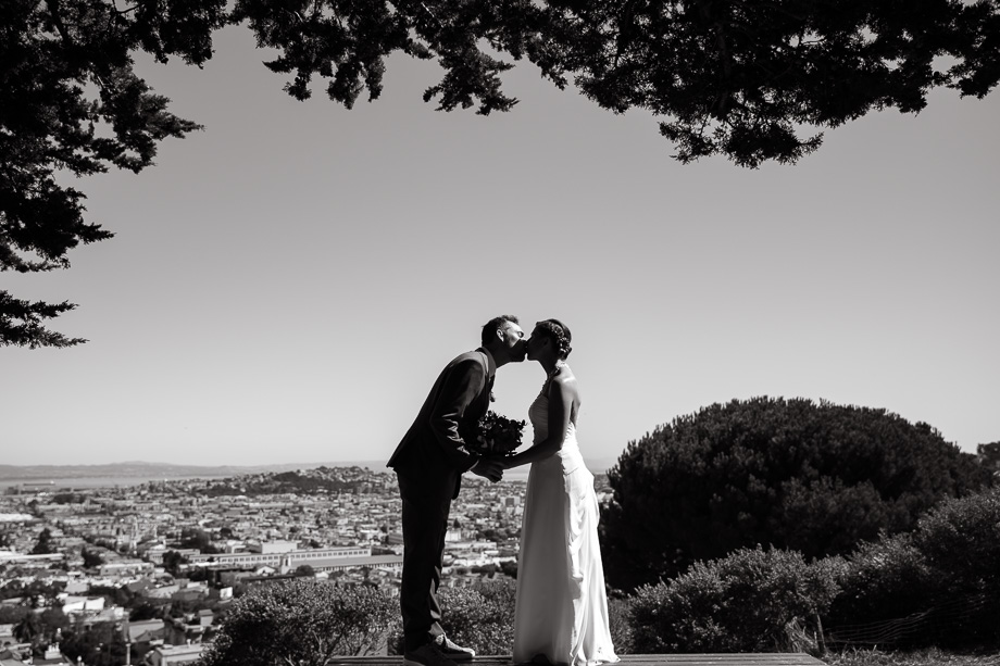 Wedding portrait under a tree overlooking San Francisco city - gorgeous couple with stunning view