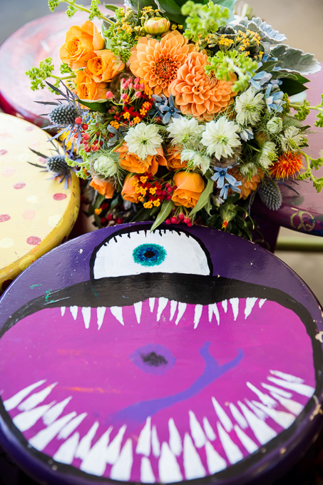 Fun photo idea - bold fall color bridal bouquet vs monster chair