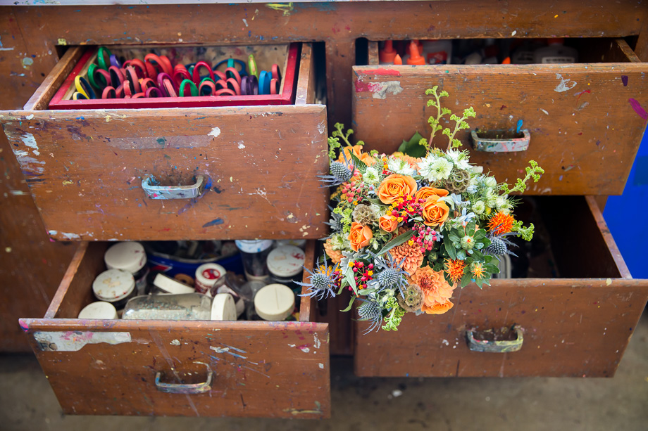 A beautiful fall color bridal bouquet in a colorful rustic setting - Randall Museum