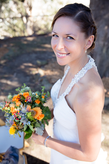 Beautiful bride with natural makeup and sleek wedding dress