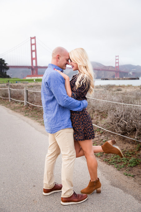 Romantic engagement photo with Golden Gate Bridge as the background