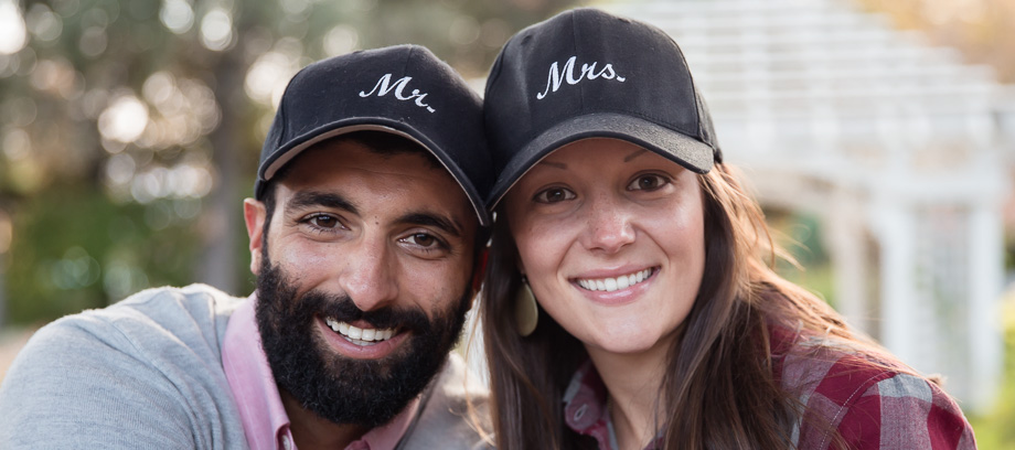 couple with matching mr/mister and mrs/missus hats
