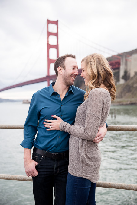 photo of couple in front of the north end of the Golden Gate Bridge