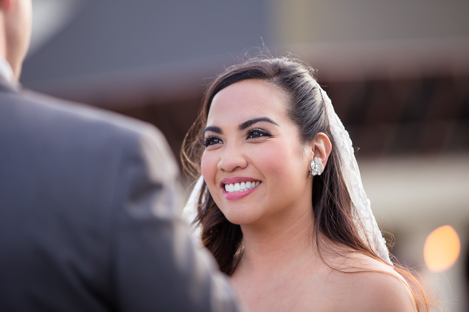 Happy and beautiful bride at the ceremony