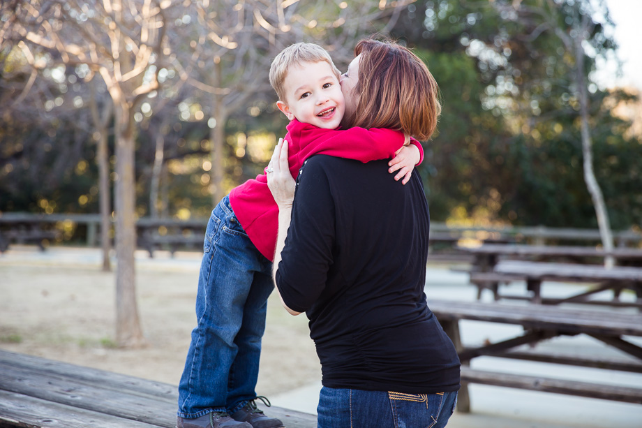 Mother and son sharing a sweet hug in Vasona park
