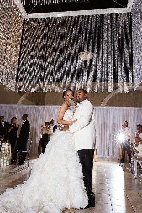 Casa Real Wedding on new years eve - couples first dance under the glamrous grand chandelier