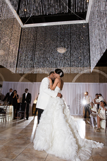 Casa Real Wedding on new years eve - couples first dance under the glamorous grand chandelier