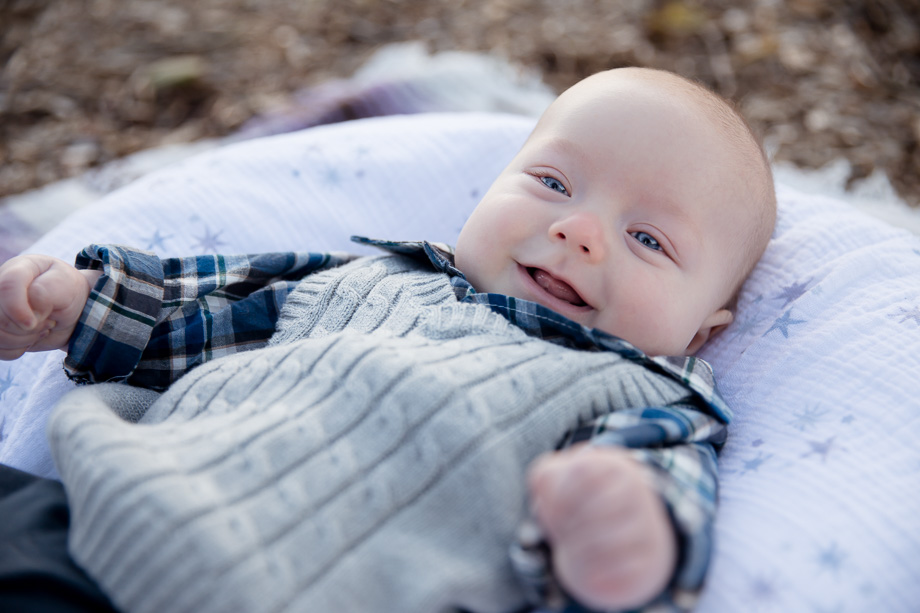 Happy 3 month old baby boy loves smiling at the camera - Vasona park