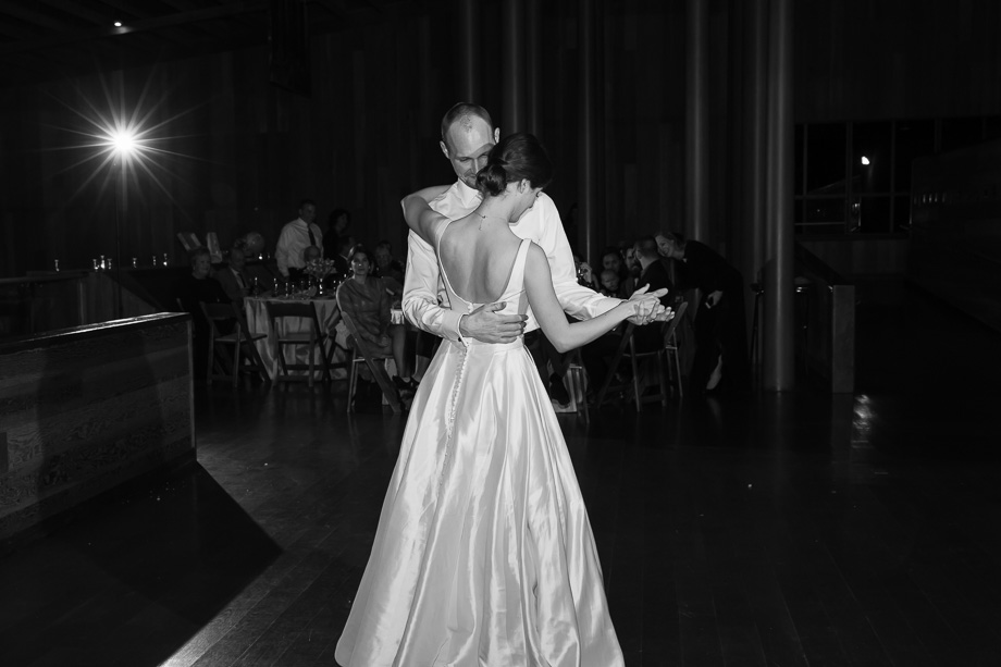 timeless b&w first dance photo at a CuriOdyssey wedding reception