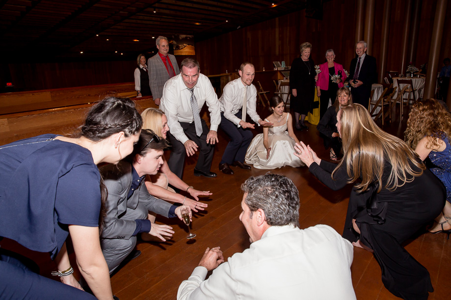 everyone is down on the dance floor at the wedding reception