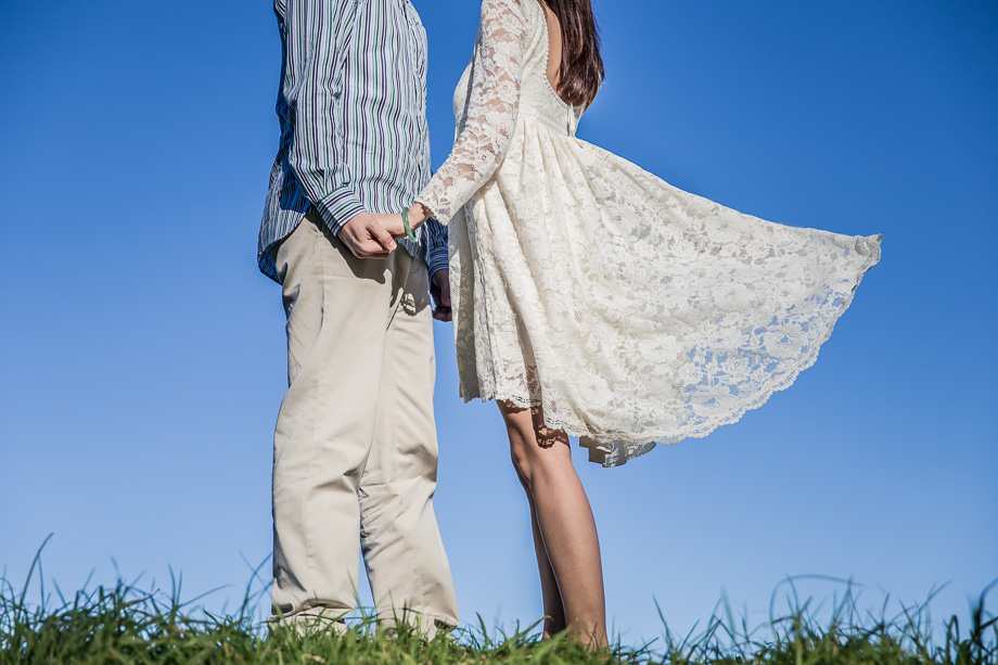 artistic and creative engagement photo - white dress and blue sky at crissy field