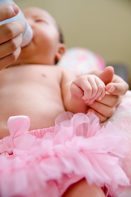 newborn in a pink tutu
