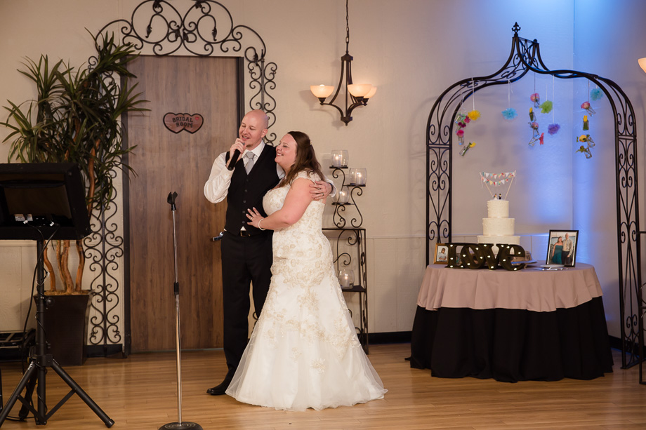 newlyweds sang a song together at their reception