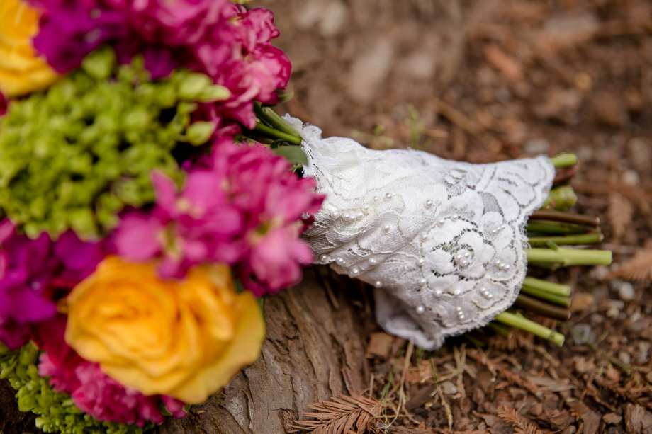 beautiful bouquet covered by a piece of lace from brides mothers wedding dress as her something old