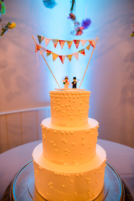 adorable wedding cake with lego cake topper