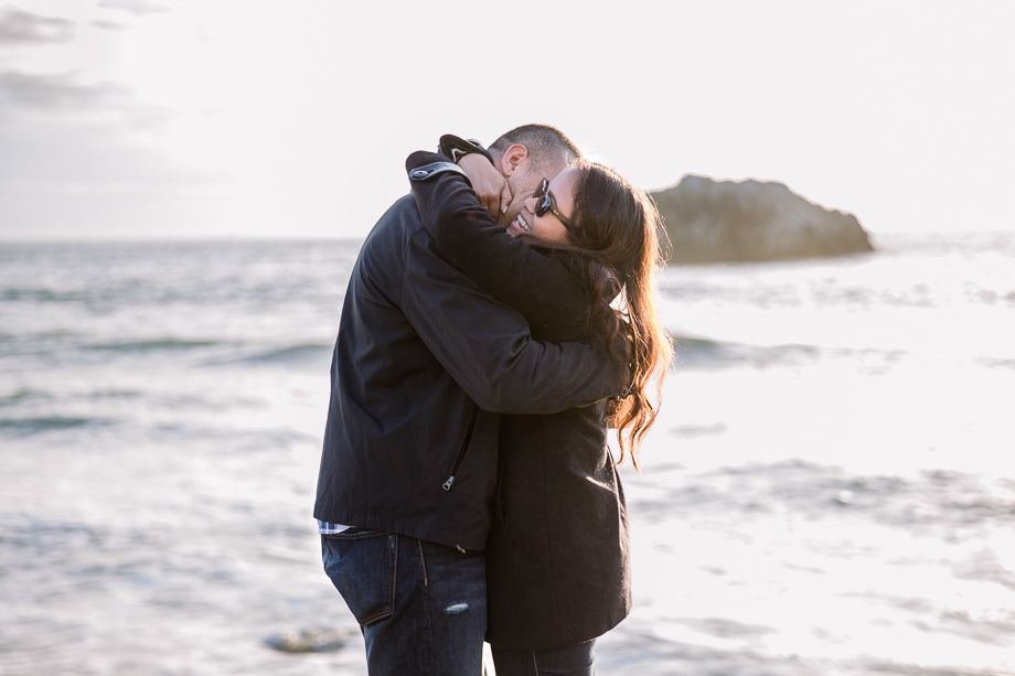 a hug full of love after their engagement