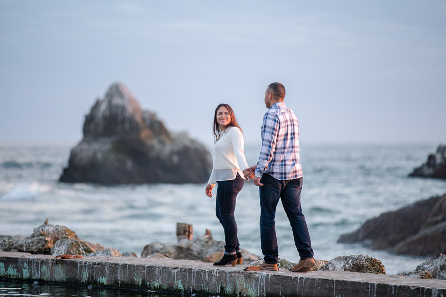 walking shot of the newly engaged couple