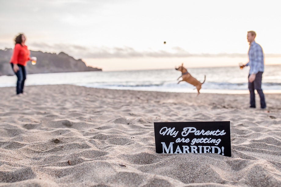 adorable Baker Beach save-the-date photo - DIY dog sign that says my parents are getting married