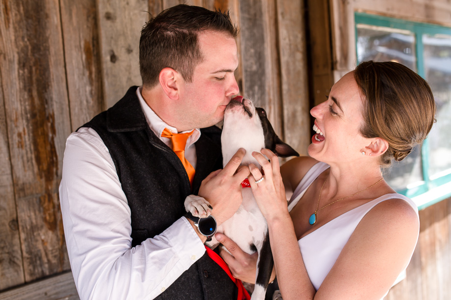 newlywed couple with their ring bearer dog