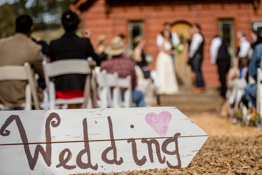 the cute wedding sign at the ceremony site