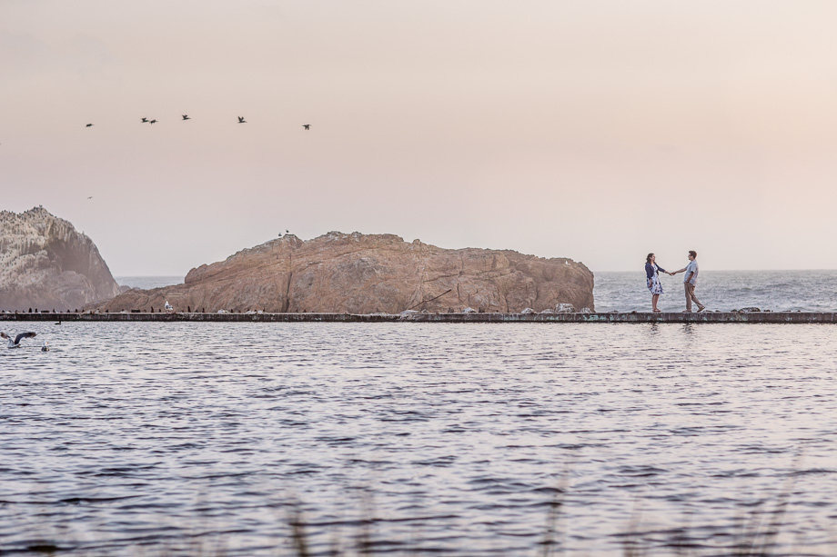 romantic Sutro Baths engagement photo at beautiful sunset