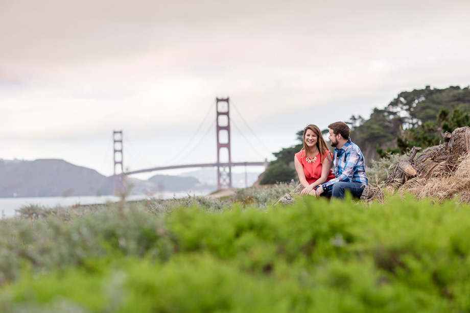 panoramic engagement photo in front of the golden gate bridge