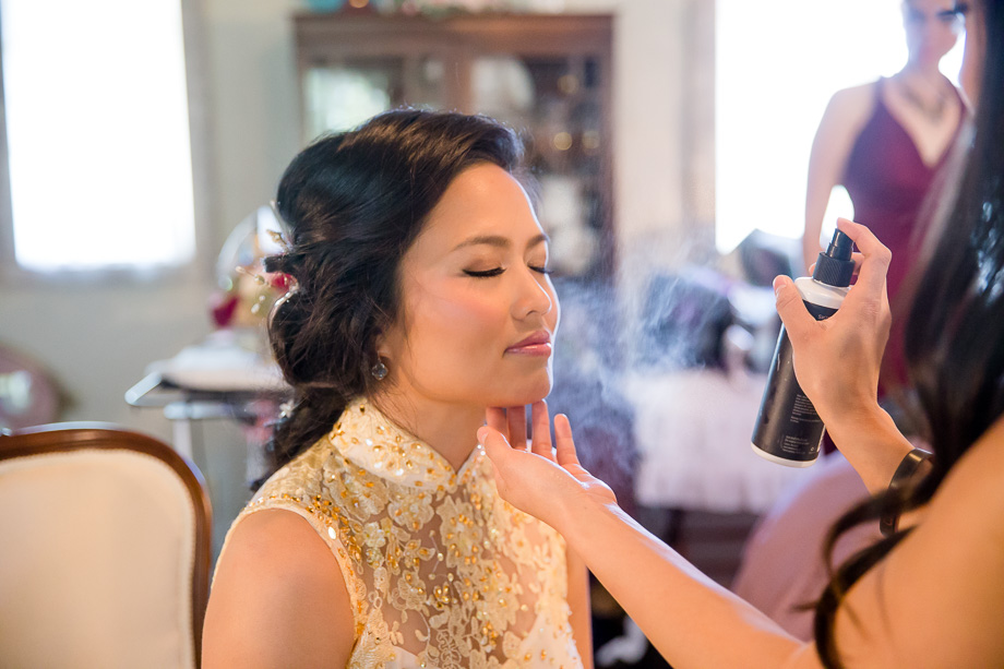 bride having her makeup and hair done at the bridal suite