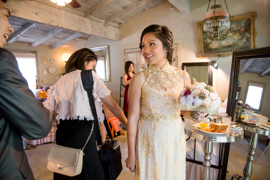 guests complimenting the bride on her wedding dress