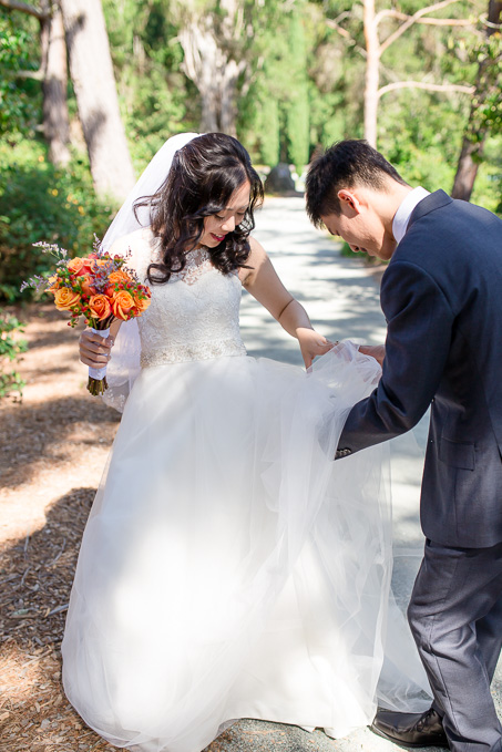 a bug got stuck inside the tulle wedding dress and groom came to the rescue