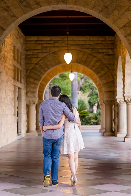 couple walking in each others arms at Stanford University