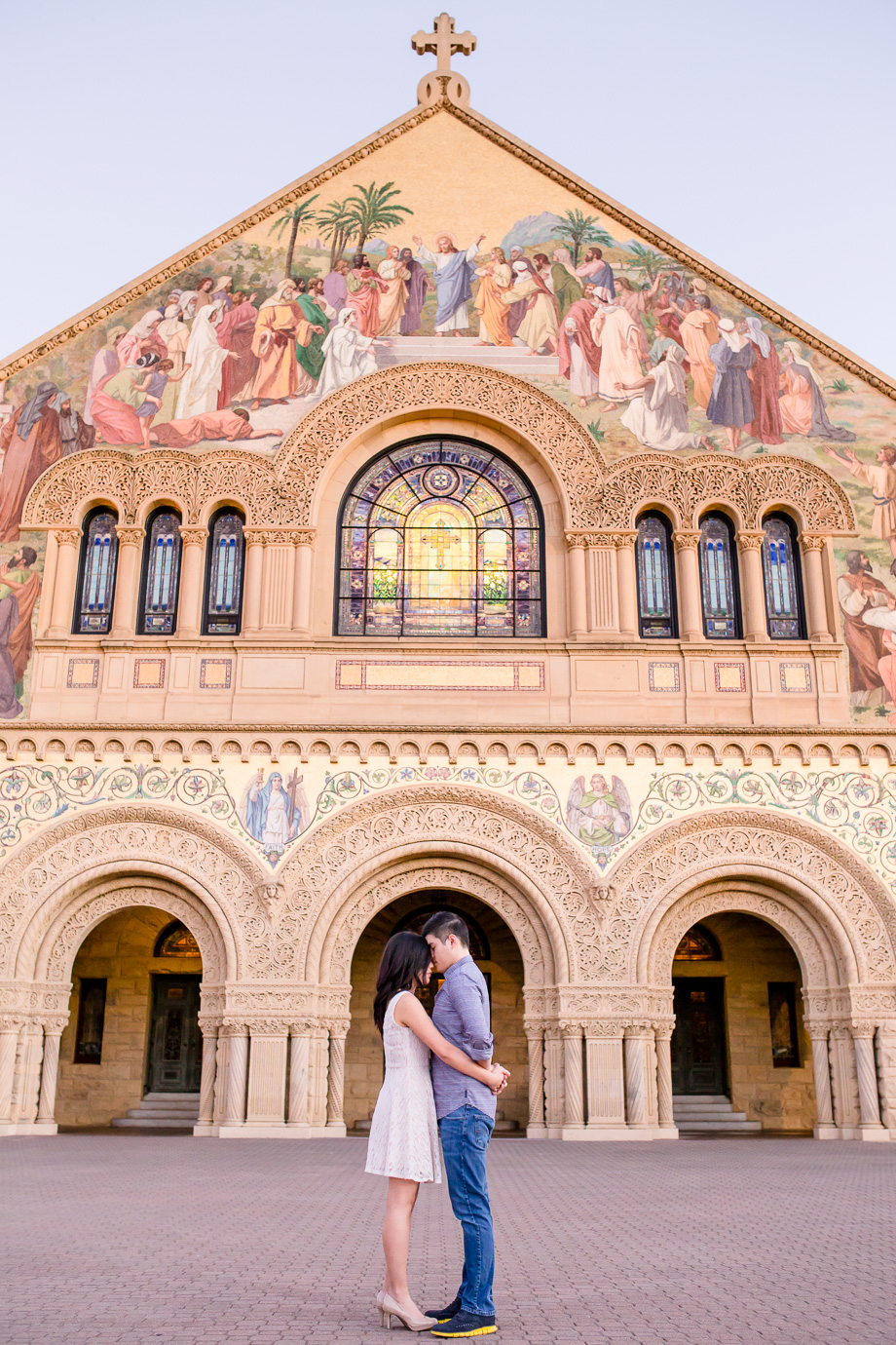 a romantic photo in front of Stanford Memorial Church
