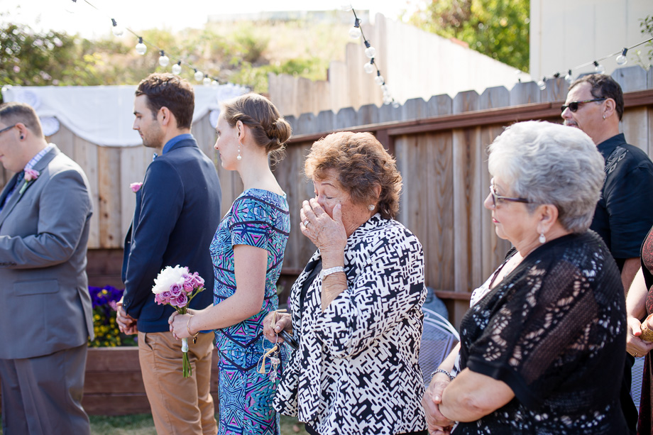 brides grandma tearing up during vow exchange
