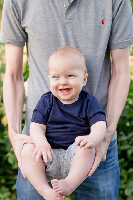 cute baby boy laughing in daddys arms - San Jose baby photographer