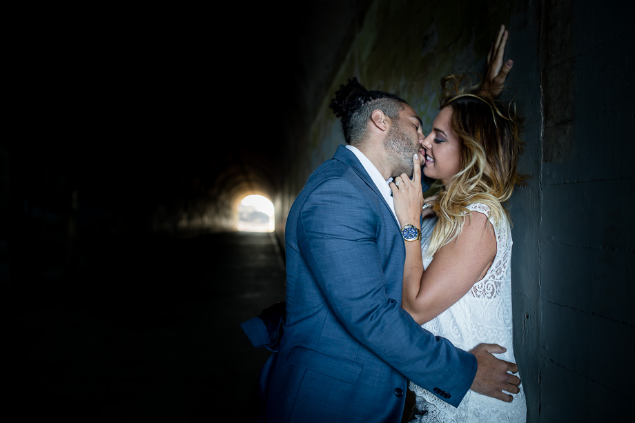 kissing inside a tunnel - San Francisco engagement and wedding photographer